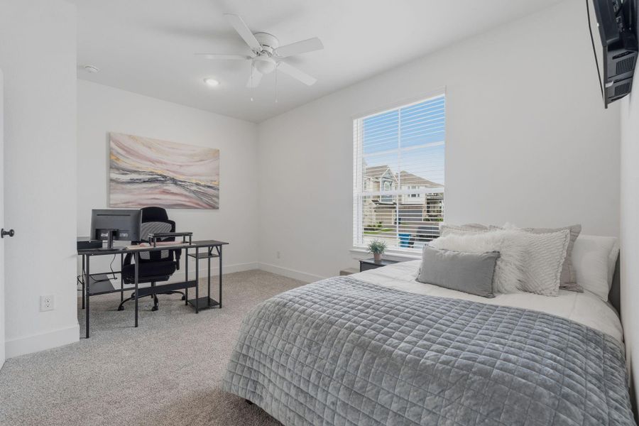 One of two secondary bedrooms. Notice how large!