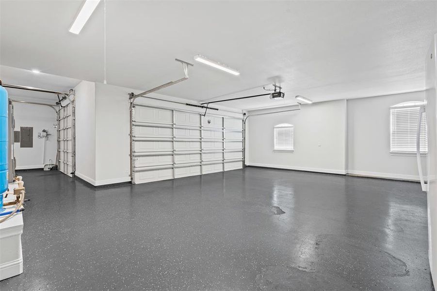 3-Car Garage with electric panel and baseboards 3-Car Garage with electric panel and baseboards