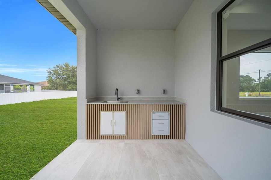 Exterior details and patio area of a home in , Lehigh Acres (Image 22).