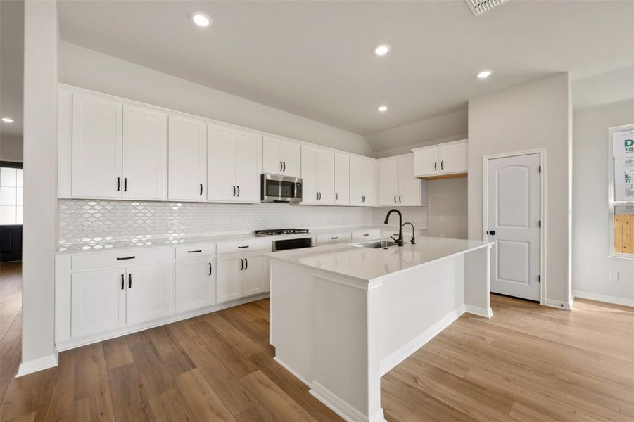 Furnished interior view inside a new home in The Colony, Bastrop (Image 11).