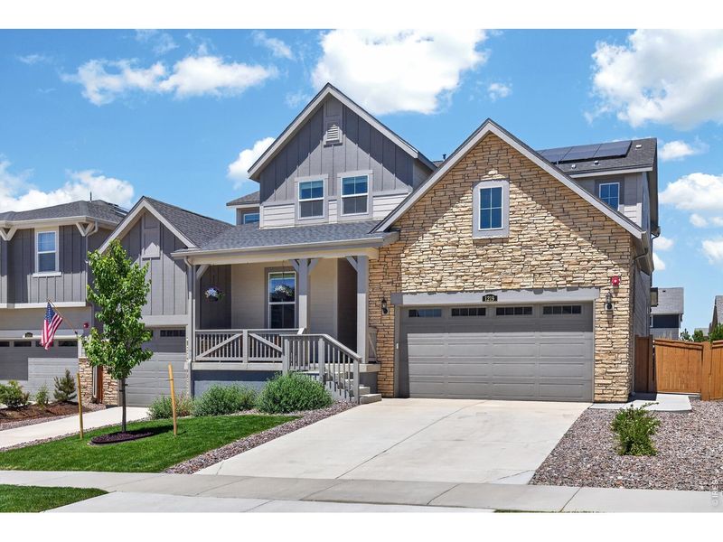 Front exterior of a new home in Sunset Village, Erie, CO, highlighting curb appeal (Image 21).