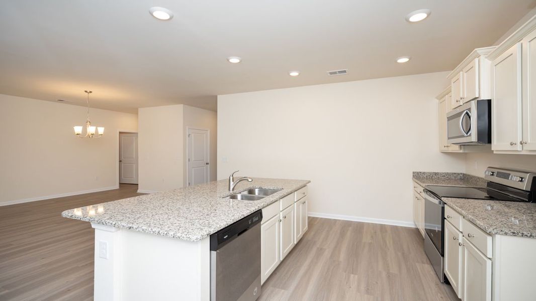 Representative furnished interior of a home built from the KERRY by D.R. Horton in The Reserve at Wild Horse, Conway (Image 11).