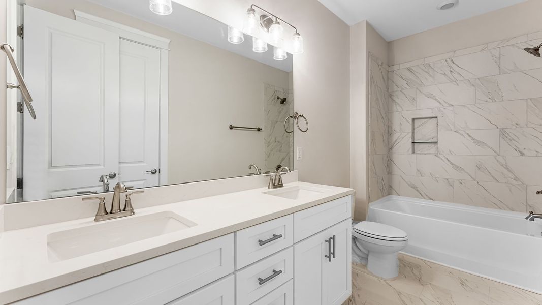 Representative furnished interior of a home built from the The Islamorada by D.R. Horton in WindMark Beach, Port Saint Joe (Image 30).