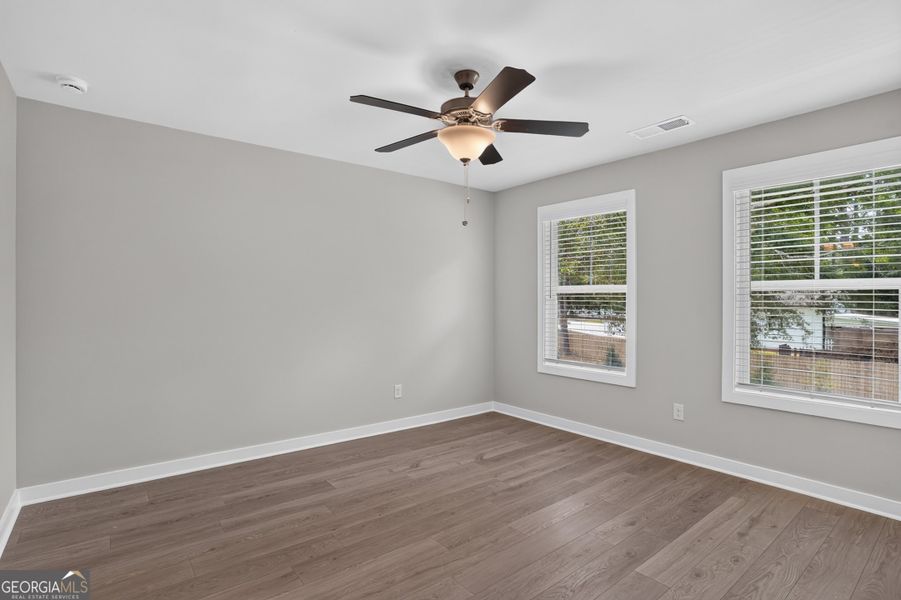 Spacious, unfurnished interior of a new home in The Cottages at East Lanier, Fayetteville (Image 14).