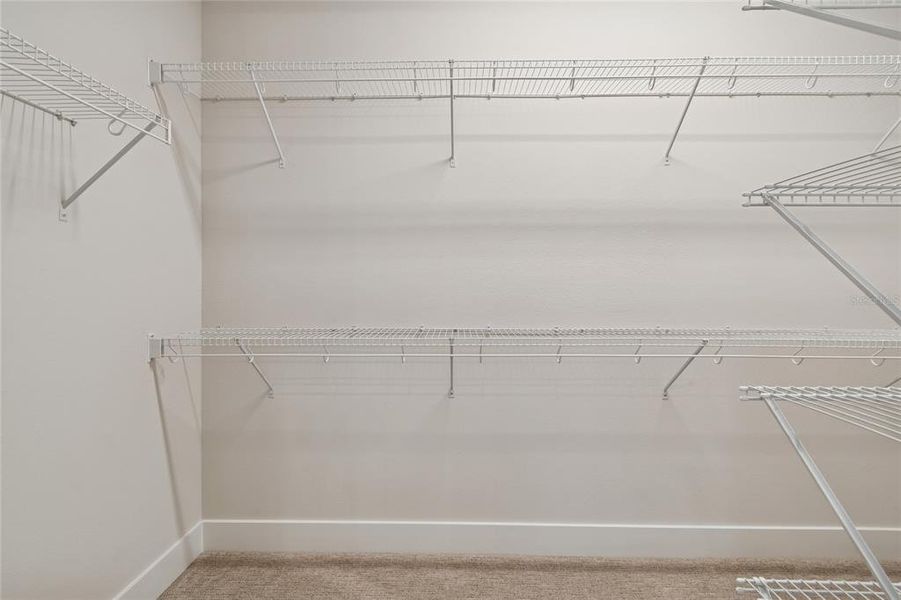 Spacious, unfurnished interior of a new home in Emerald Landing at Waterside at Lakewood Ranch – Cottage Series, Sarasota (Image 27).