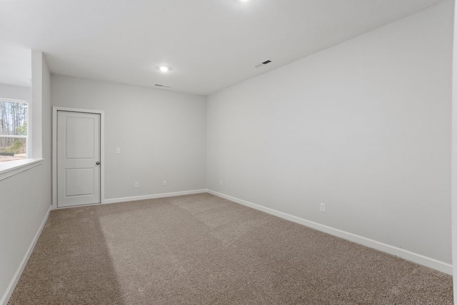 Spacious, unfurnished interior of a new home in Ovation at Sweetbrier, Durham (Image 18).