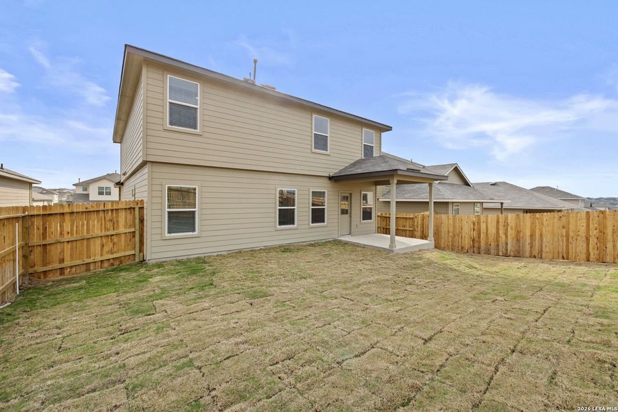 Exterior details and patio area of a home in Redbird Ranch, San Antonio (Image 2).