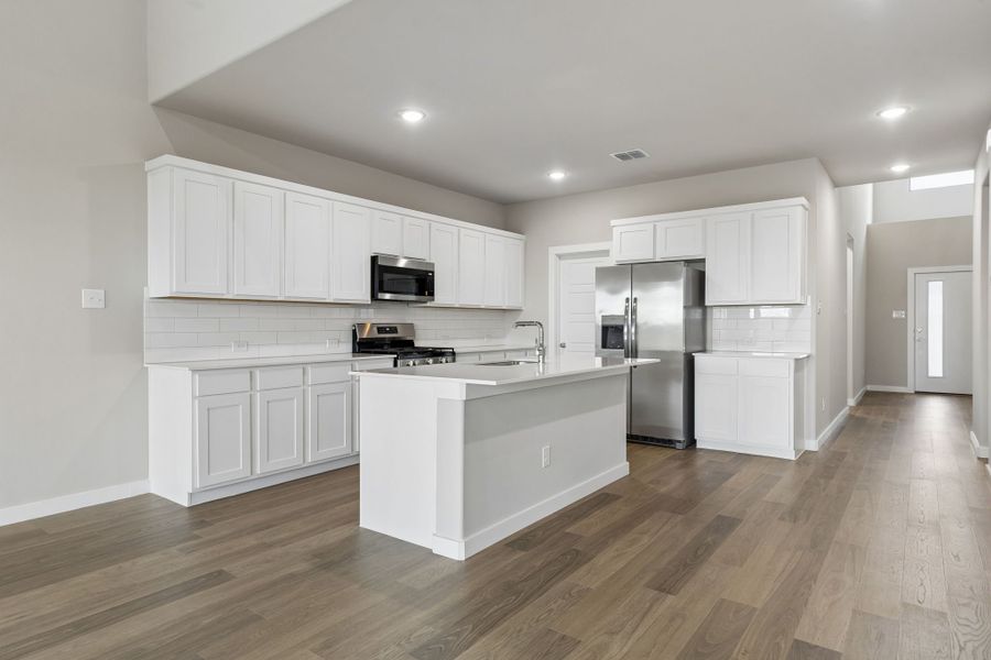 Kitchen in the Winters home plan by Trophy Signature Homes – REPRESENTATIVE PHOTO