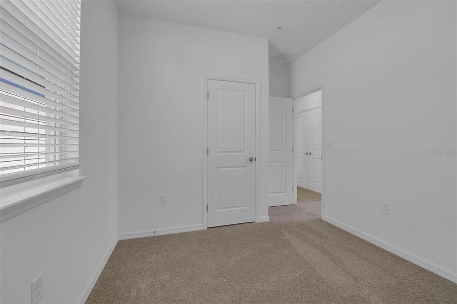 Spacious, unfurnished interior of a new home in Brack Ranch, St. Cloud (Image 32).