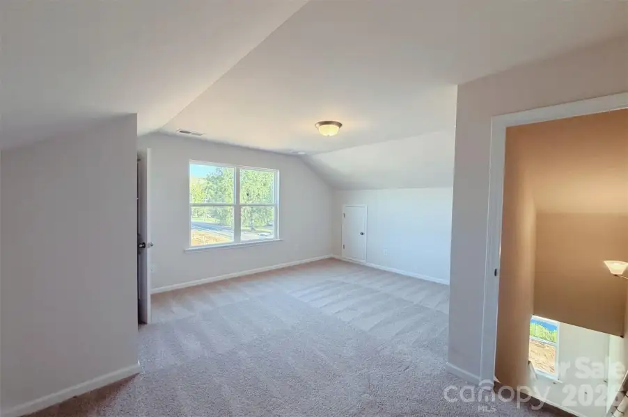 Spacious, unfurnished interior of a new home in Dawson Landing, Charlotte (Image 19).
