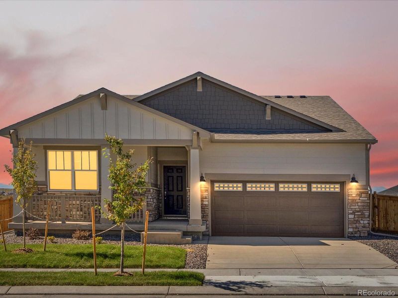 Front exterior of a new home in Buffalo Highlands: The Canyon Collection, Commerce City, CO, highlighting curb appeal (Image 2).