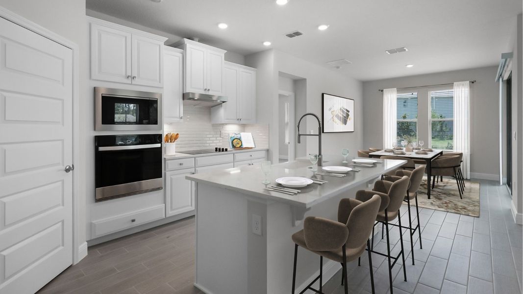 Representative furnished interior of a home built from the BELLMORE by D.R. Horton in Waterleigh, Winter Garden (Image 3).