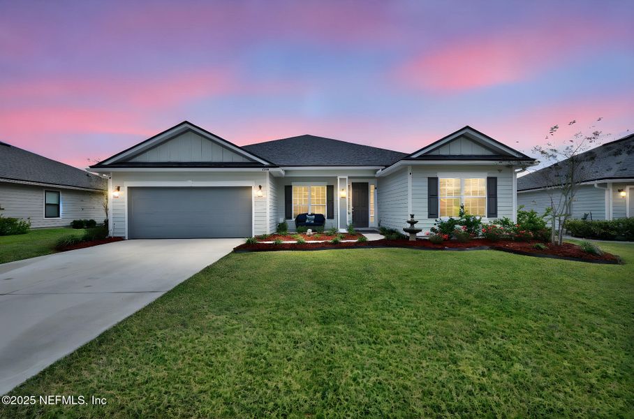 Front exterior of a new home in , Middleburg, FL, highlighting curb appeal (Image 2). Front exterior of a new home in , Middleburg, FL, highlighting curb appeal (Image 2).