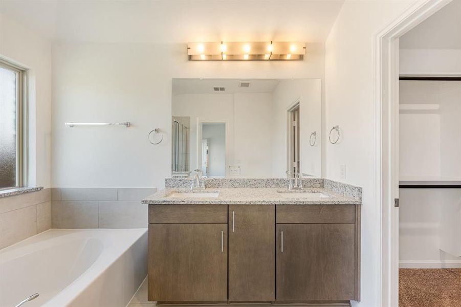 Furnished interior view inside a new home in Bear Creek Elements, Lavon (Image 8).