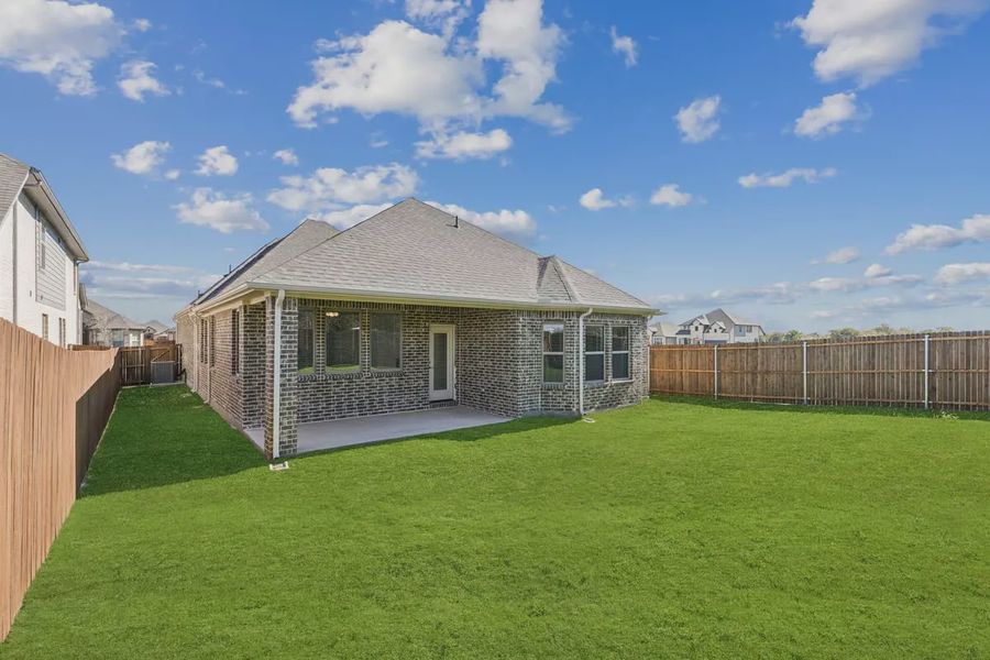 Exterior details and patio area of a home in Summer Crest, Crowley (Image 18).