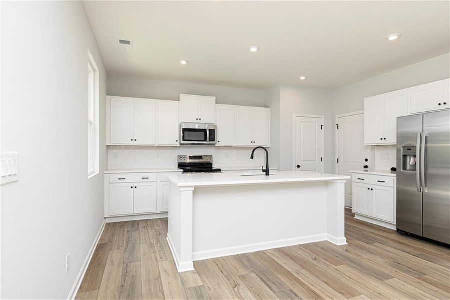 Furnished interior view inside a new home in Rhodes Glen, Lawrenceville (Image 5).