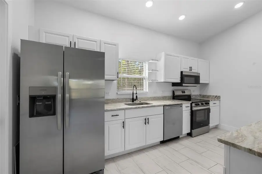 Furnished interior view inside a new home in , Punta Gorda (Image 6).