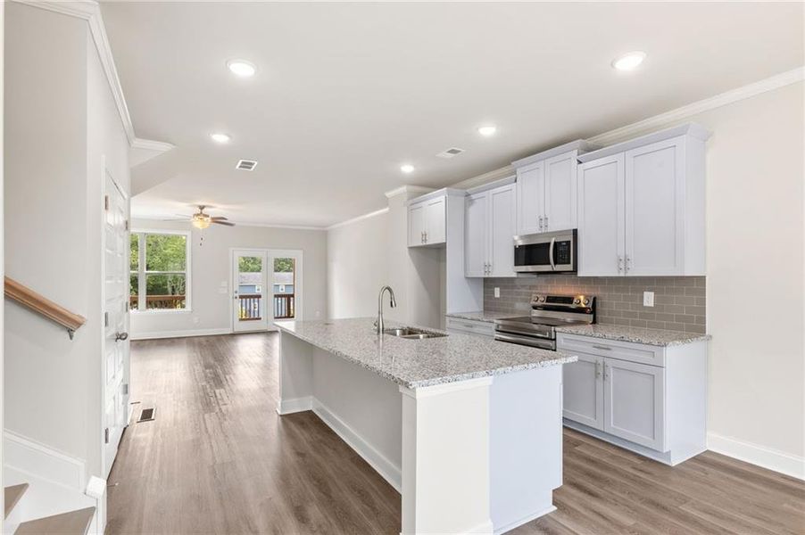 Furnished interior view inside a new home in Towns at Enclave, Lawrenceville (Image 8).