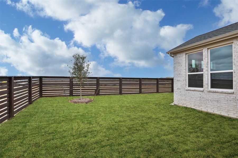Exterior details and patio area of a home in Bridgeland Central, Cypress (Image 23).