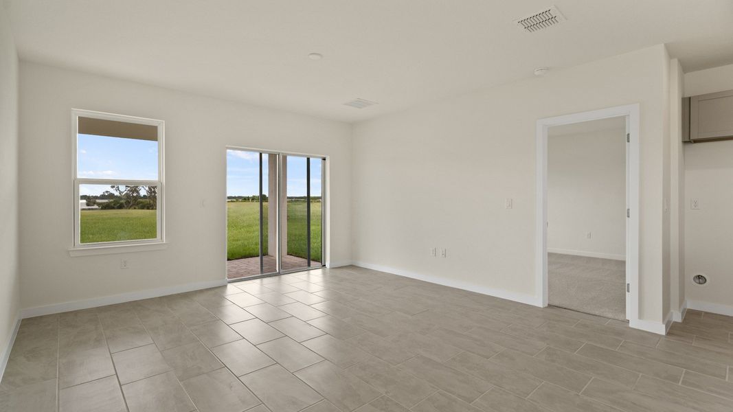 The Naples Kitchen with large Island Quick Move-In Home at Willowbrook North by DRB Homes in Winter Haven, FL The Naples Kitchen with large Island Quick Move-In Home at Willowbrook North by DRB Homes in Winter Haven, FL