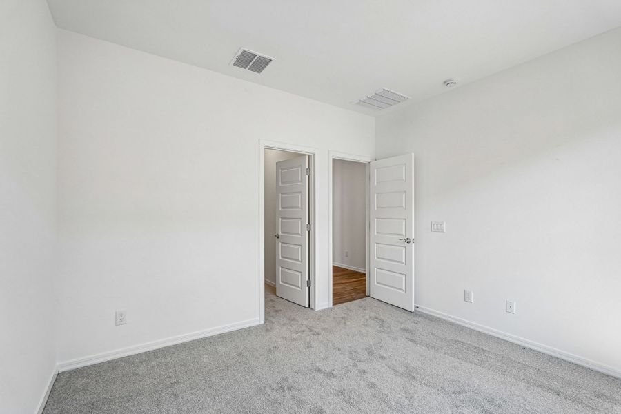 Spacious, unfurnished interior of a new home in Hawes Crossing, Mesa (Image 36).