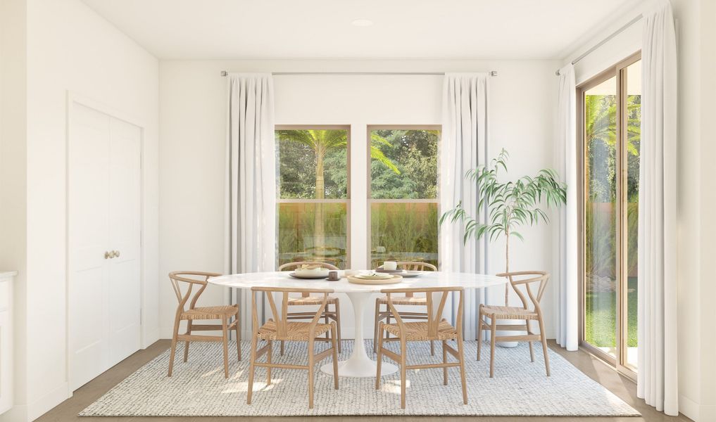 Cozy dining area adjacent from kitchen and great room