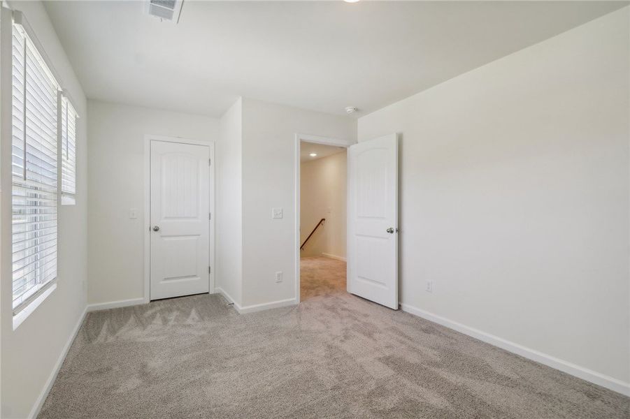 This spacious room offers comfort and versatility. This spacious room offers comfort and versatility.