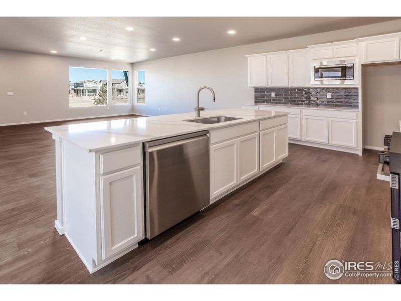 Furnished interior view inside a new home in Trailside Alley Load - Single Family Homes, Timnath (Image 11).