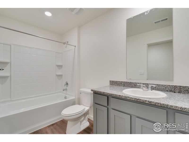 Furnished interior view inside a new home in Silver Peaks, Lochbuie (Image 9).