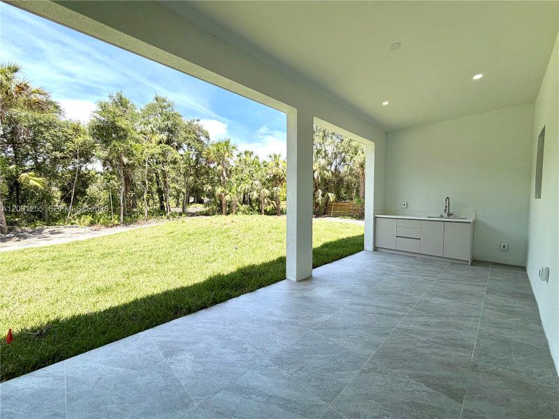 Exterior details and patio area of a home in , Naples (Image 4). Exterior details and patio area of a home in , Naples (Image 4).