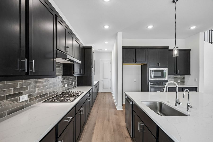 Furnished interior view inside a new home in Freedom at Anthem, Kyle (Image 5).