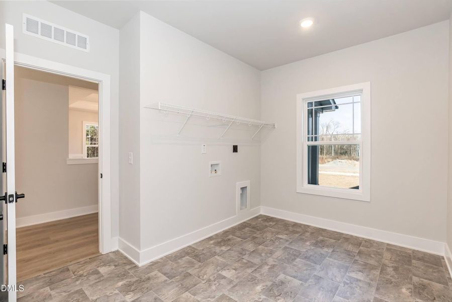 Spacious, unfurnished interior of a new home in Charlotte's Ridge, Middlesex (Image 36).