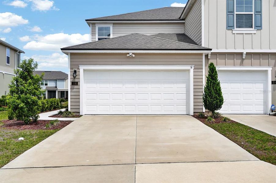 Front exterior of a new home in , Palm Coast, FL, highlighting curb appeal (Image 24).