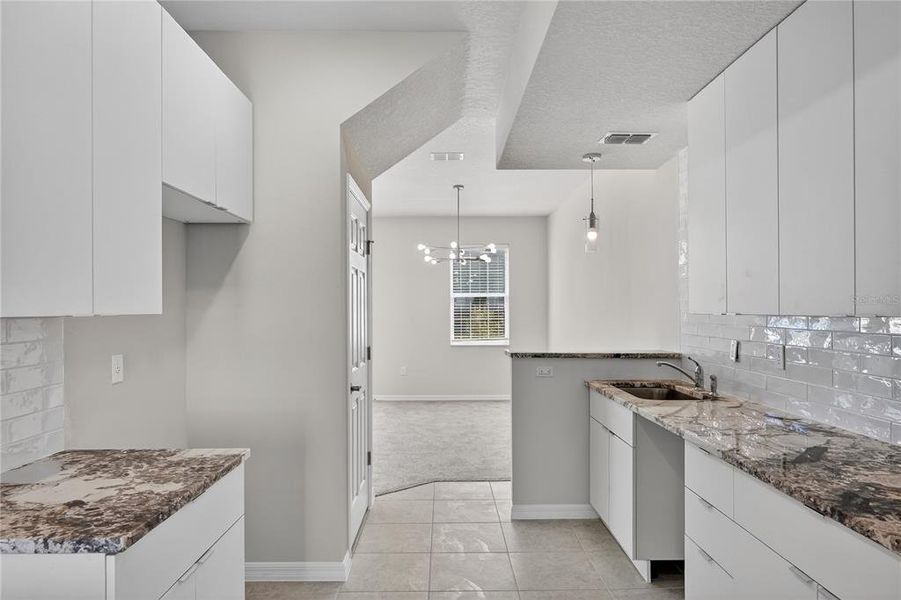 Furnished interior view inside a new home in , Davenport (Image 11).