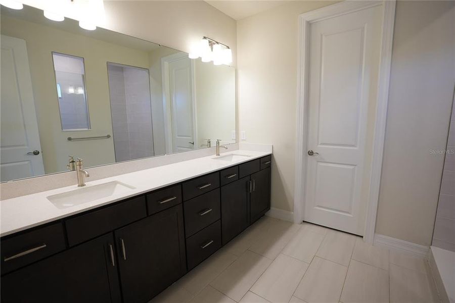 Furnished interior view inside a new home in Parkview Reserve, Orlando (Image 10).