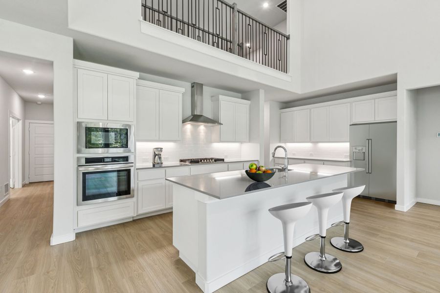 Kitchen in the Mercury home plan by Trophy Signature Homes – REPRESENTATIVE PHOTO Kitchen in the Mercury home plan by Trophy Signature Homes – REPRESENTATIVE PHOTO