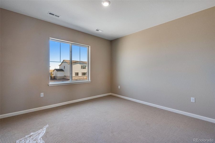 Spacious, unfurnished interior of a new home in Ensemble at The Aurora Highlands, Aurora (Image 22). Spacious, unfurnished interior of a new home in Ensemble at The Aurora Highlands, Aurora (Image 22).