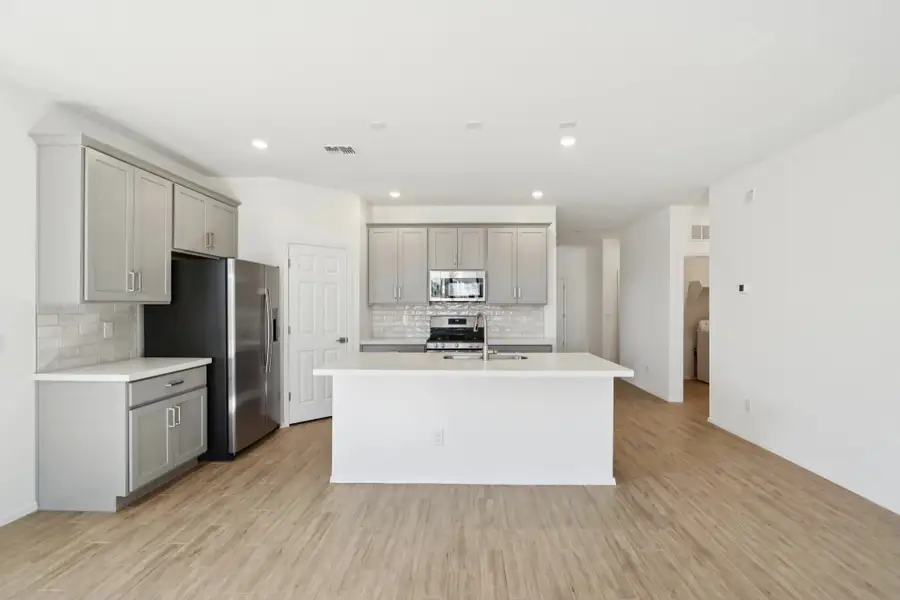 Kitchen featuring the Milan Collection. Not actual home, finishes may vary.