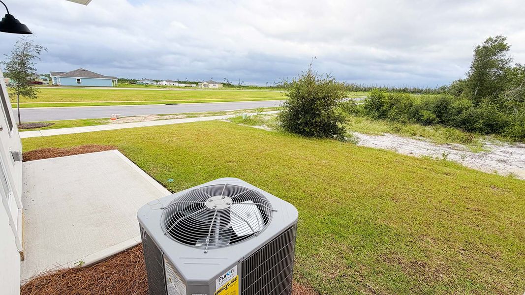 Exterior details and patio area of a home in Salt Creek Townhomes at Mexico Beach, Mexico Beach (Image 19).