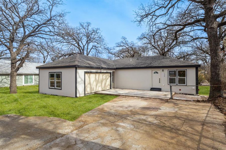 Front exterior of a new home in , Azle, TX, highlighting curb appeal (Image 16).