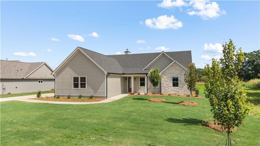 Front exterior of a new home in , Madison, GA, highlighting curb appeal (Image 28).