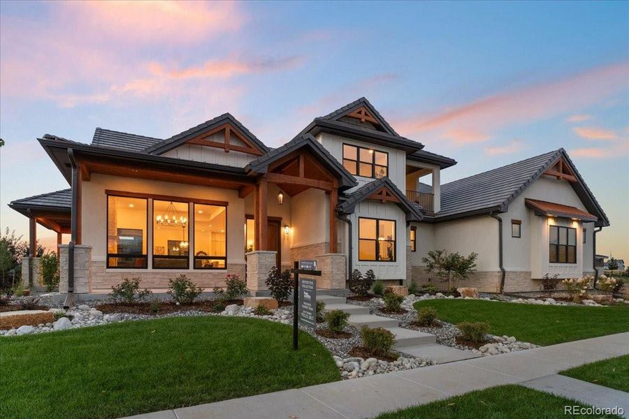 Front exterior of a new home in , Berthoud, CO, highlighting curb appeal (Image 2).