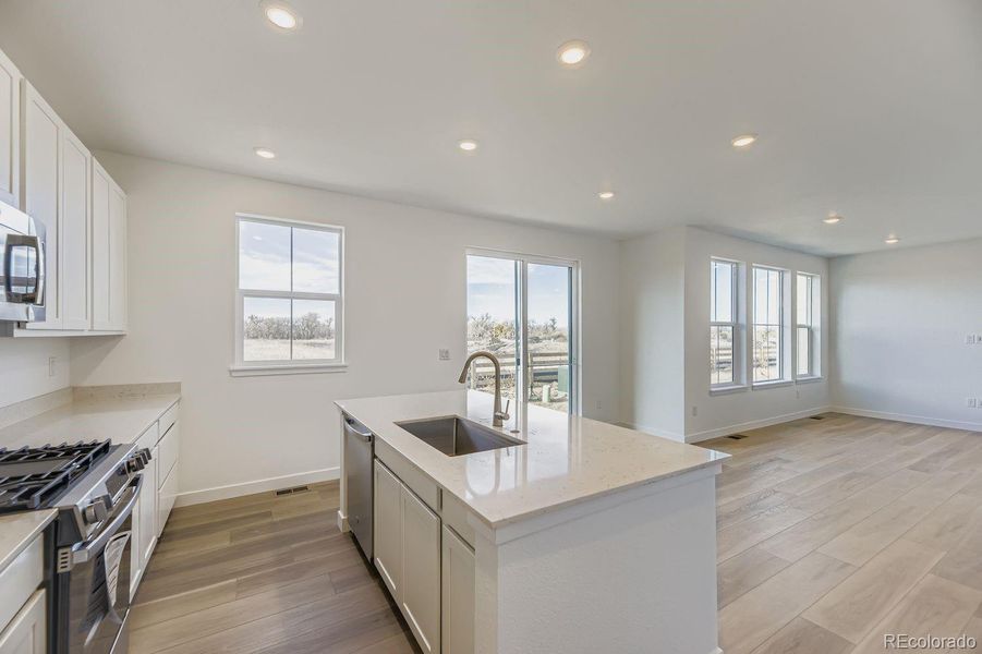 Furnished interior view inside a new home in Vermilion Creek: The Pioneer Collection, Centennial (Image 4).