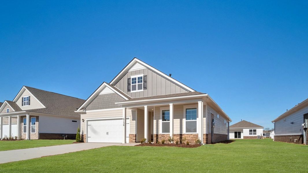 Front exterior of a new home in Legacy Farms, White House, TN, highlighting curb appeal (Image 2). Front exterior of a new home in Legacy Farms, White House, TN, highlighting curb appeal (Image 2).