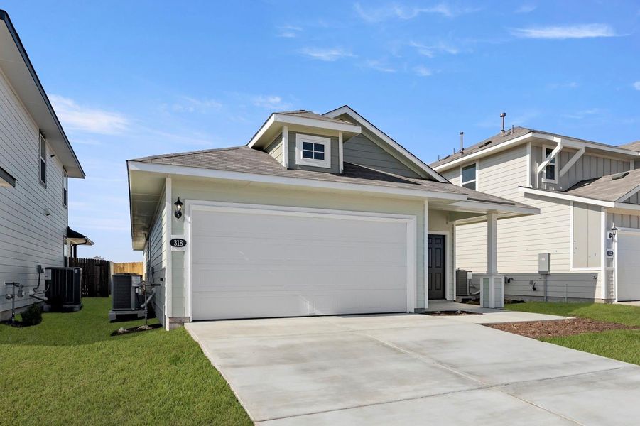 Front exterior of a new home in Hymeadow, Maxwell, TX, highlighting curb appeal (Image 20).