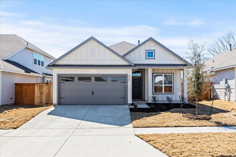 Front exterior of a new home in Trace, San Marcos, TX, highlighting curb appeal (Image 21). Front exterior of a new home in Trace, San Marcos, TX, highlighting curb appeal (Image 21).