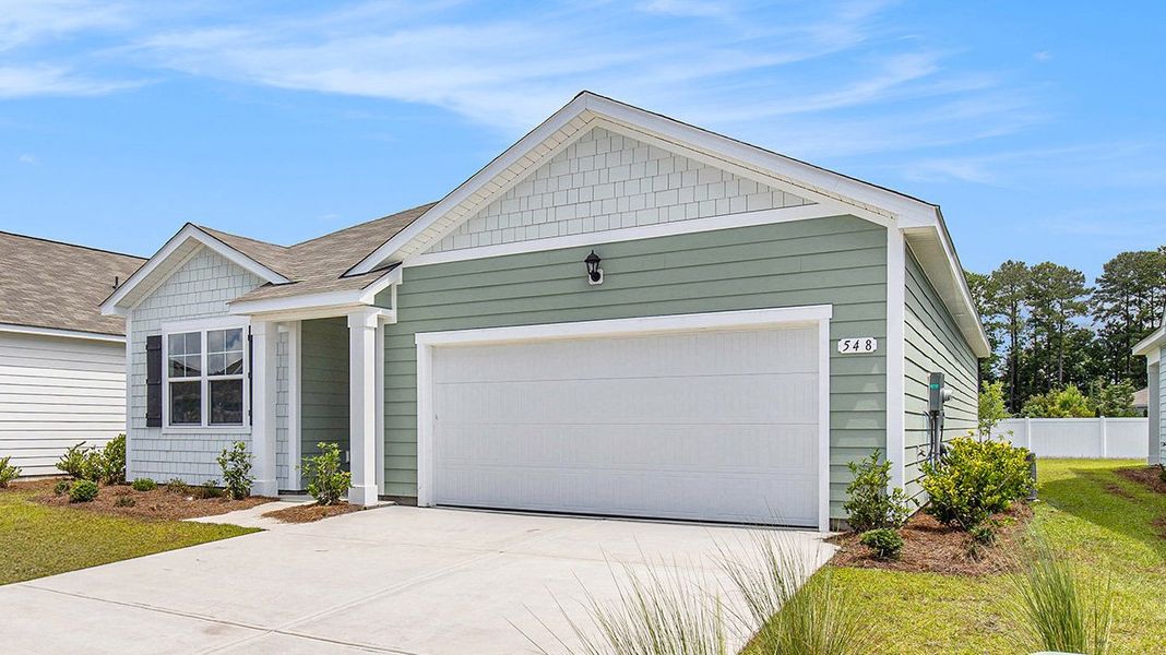 Front exterior of a new home in Kingston Bay, Conway, SC, highlighting curb appeal (Image 20).