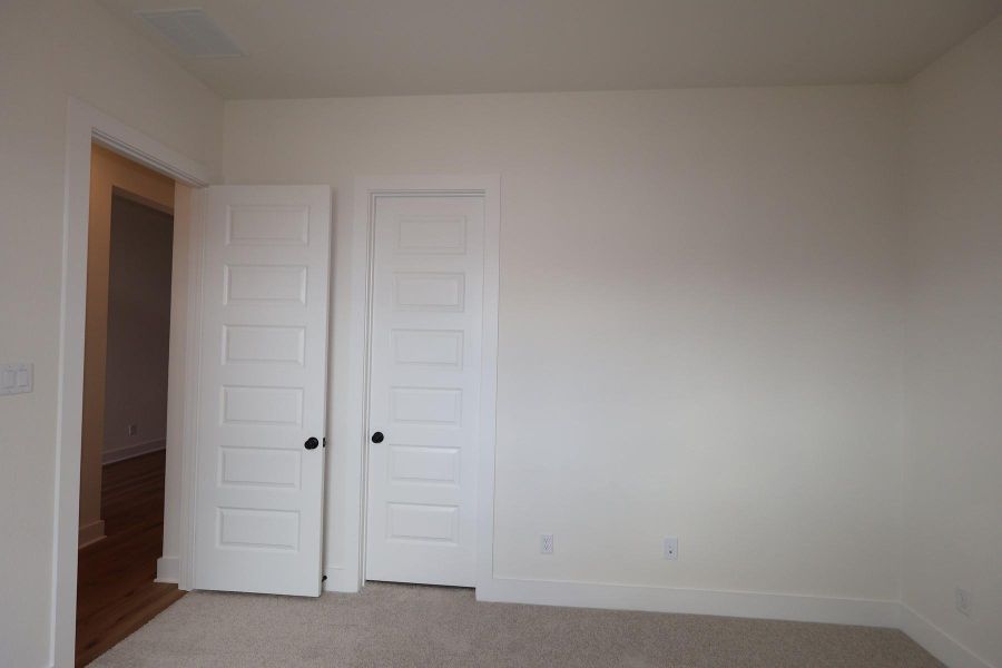 Spacious, unfurnished interior of a new home in Dunham Pointe, Cypress (Image 33).