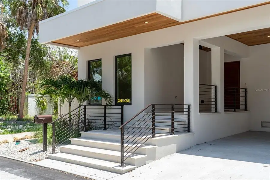 Exterior details and patio area of a home in , Sarasota (Image 32).