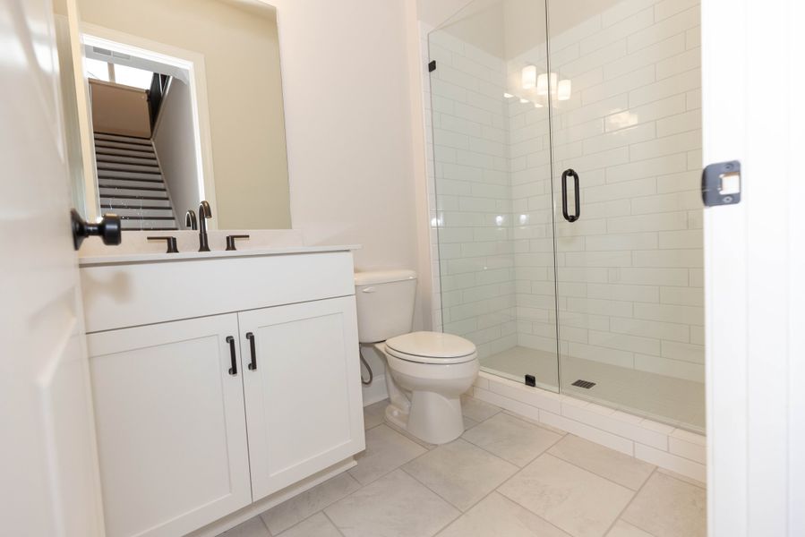 Representative furnished interior of a home built from the The Tensley by The Providence Group in Waterhaven, Cumming (Image 10).